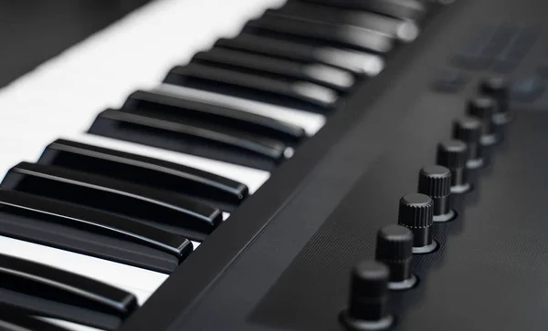 Professional midi keyboard synthesizer with knobs and controllers. — Stock Photo, Image