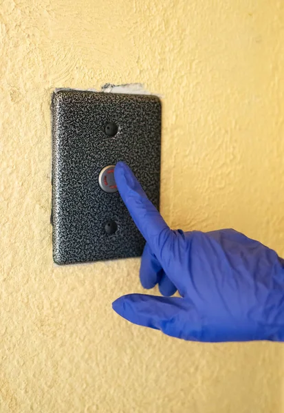 Hand Glove Pressing Elevator Button — Stock Photo, Image