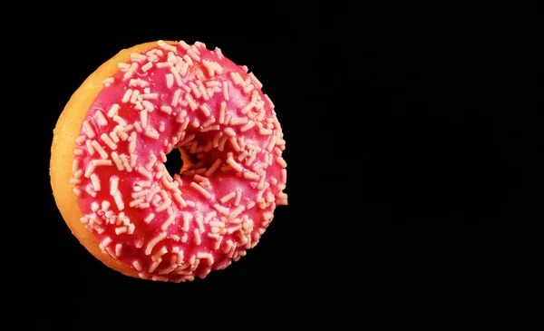 Donut Vitrificado Rosa Voador Com Polvilhas — Fotografia de Stock