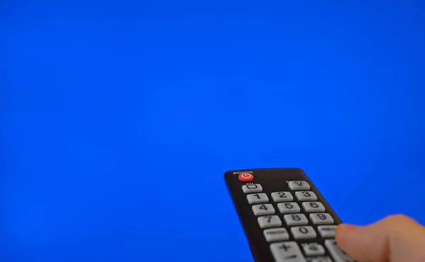 Male Hand Remote Control Pointing Screen Blue Chroma Key — Stock Photo, Image
