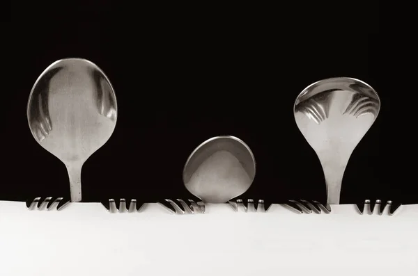Abstract Family Made Spoon Forks Sitting Table — Stock Photo, Image