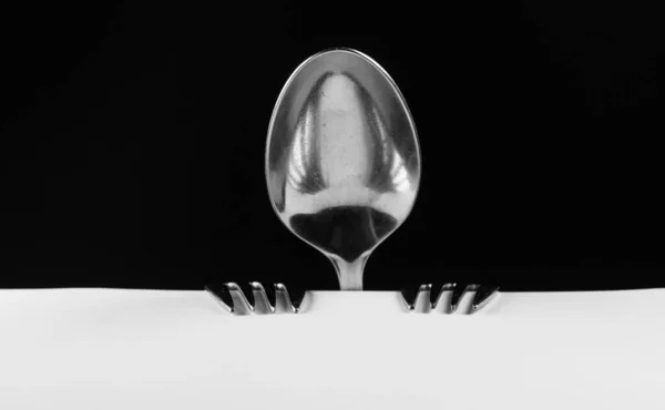 Abstract Person Made Spoon Forks Sitting Table — Stock Photo, Image