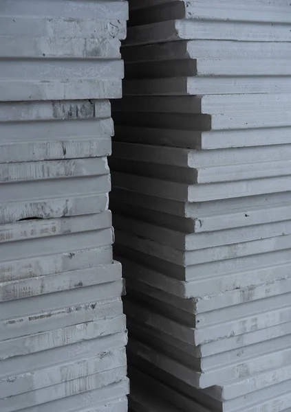 Achtergrond van bouwmaterialen-tong-en-groef gipsblokken — Stockfoto