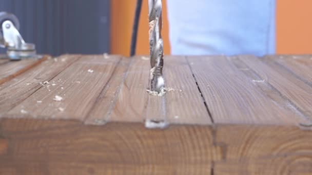 Beauty of slow motion in construction and repair. working with wood - drilling holes close up, slow motion — Stock Video