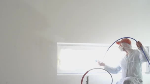 Repair Of The Apartment Professional Painter Paints Walls