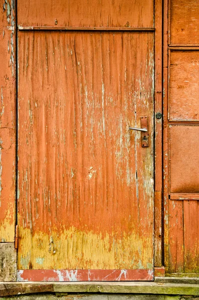 Velmi Staré Omšelé Oranžové Dveře Staré Opuštěné Budovy Textury — Stock fotografie