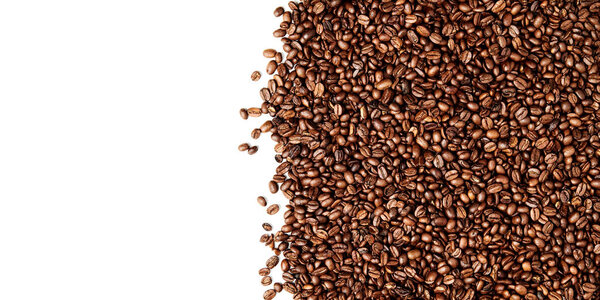 Layer of Roasted Coffee beans over white background, negative space on the left part of the image, high resolution 10980 x 5504 pixels, 60 megapixels