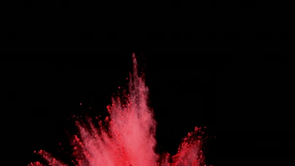 Super zpomalené exploze zbarveného prášku izolované na černém pozadí. Natočeno na vysokou rychlost fotoaparátu, 1000 fps.