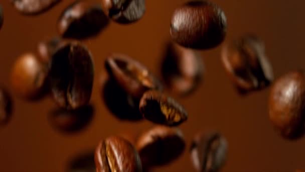 Super Slow Motion Falling Coffee Beans Filmed High Speed Cinema — Stock Video