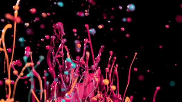 Abstract coloured paint splashes isolated on black background. Macro photo, artistic design.