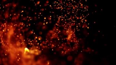 Siyah arka planda izole edilmiş çok yavaş ateş kıvılcımları. Yüksek hızlı kamera, 1000 fps.