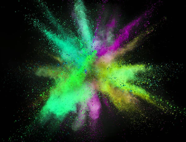 Explosion of colored powder isolated on black background. Abstract colored background