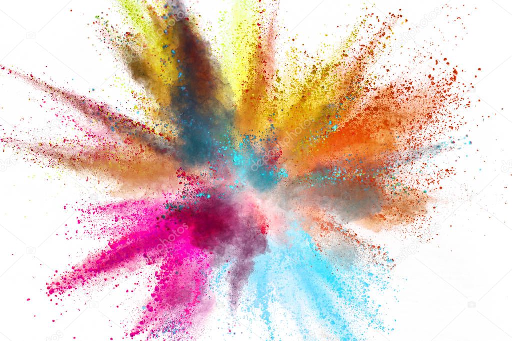 Multi colored powder explosion isolated on white background. Freeze motion of abstract dust texture.