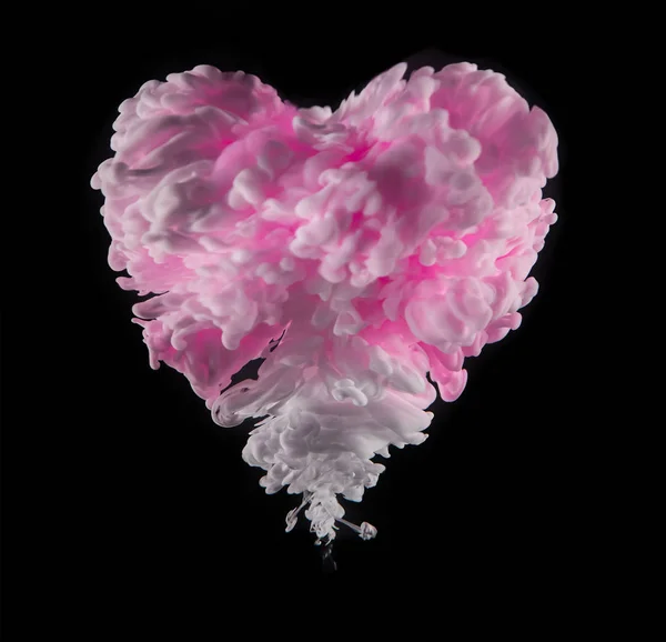 Inchiostro acrilico colorato a forma di cuore su nero — Foto Stock