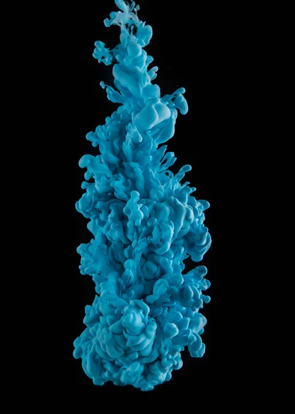 Coloured acrylic ink mixing in water on black — Stock Photo, Image