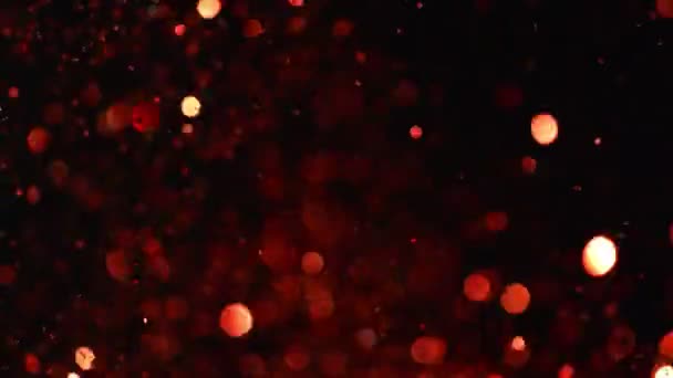 Siyah Arka Plan Üzerine Süper Işıltılı Yavaş Kırmızı Parçacıklar Odak — Stok video