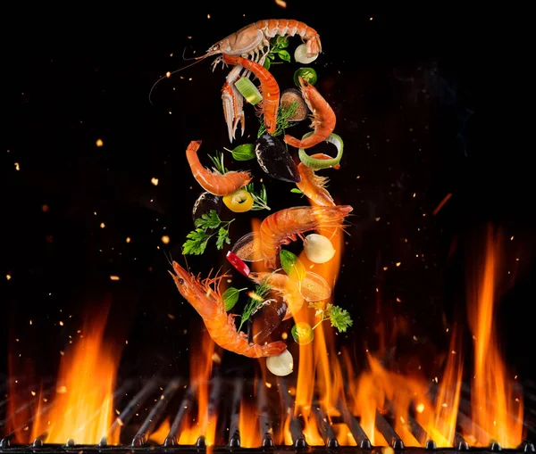 Flying sea fruit and vegetable pieces — Stock Photo, Image