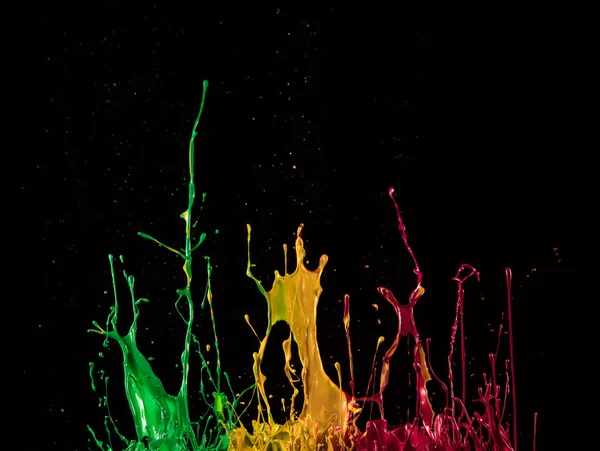Macro photo of mixed acryl colors on black — Stock Photo, Image