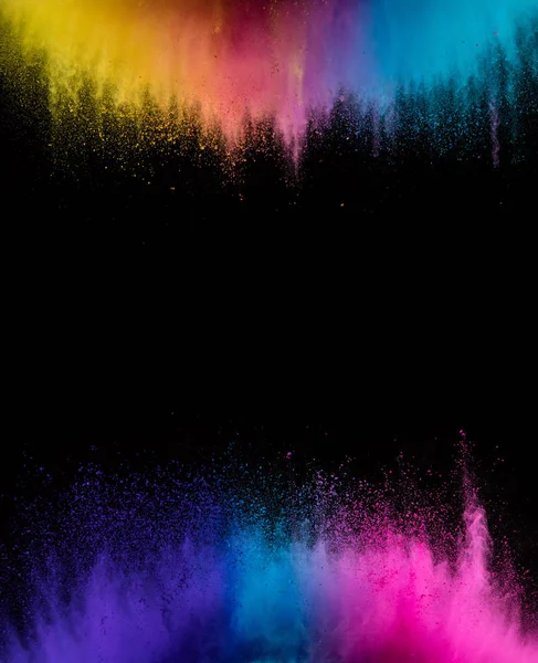 Explosion of colored powder isolated on black — Stock Photo, Image