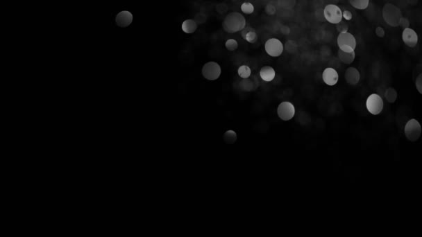 在黑色背景上闪耀着银色颗粒的超慢运动 浅的焦点深度 在高速影院摄像机上拍摄 1000 Fps — 图库视频影像