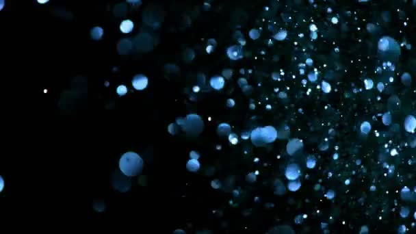 Super Langzame Beweging Van Glinsterende Blauwe Deeltjes Zwarte Achtergrond Ondiepe — Stockvideo