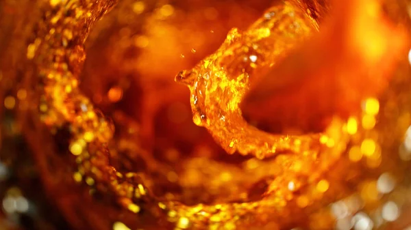 Detail of cola, tea or hard spirit beverages whirl — Stock Photo, Image
