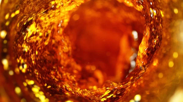 Detail of cola, tea or hard spirit beverages whirl — Stock Photo, Image