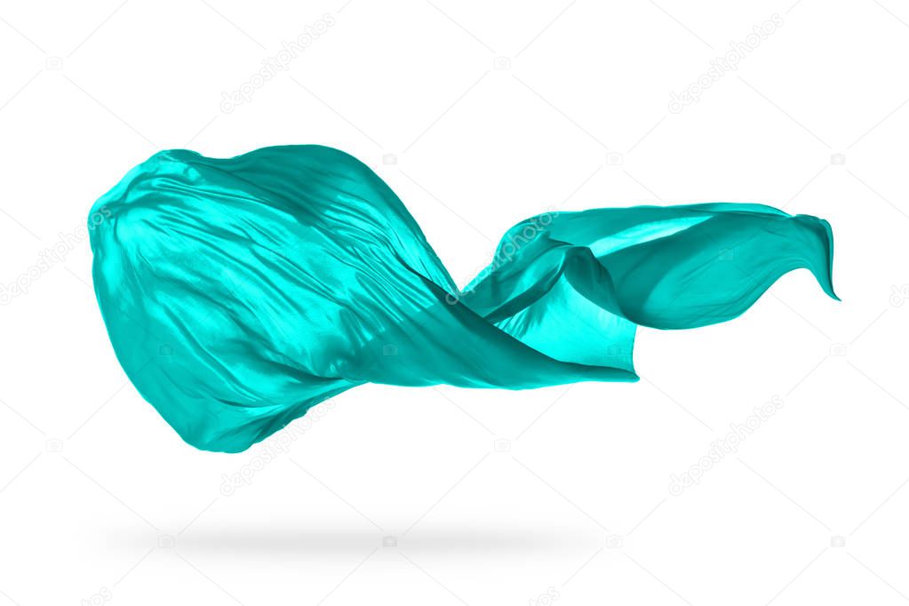 Flying piece of coloured cloth on white background