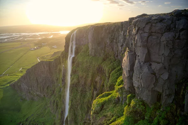 Dramatic top view of waterfall peak, Iceland