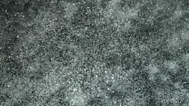 Super Zeitlupe Glitzernder Silberpartikel Auf Schwarzem Hintergrund Geringe Schärfentiefe Gefilmt — Stockvideo