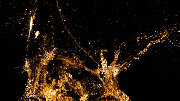 Golden splashes isolated on black background — Stock Photo, Image