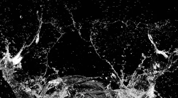 Πιτσιλιές νερού που απομονώνονται σε μαύρο φόντο — Φωτογραφία Αρχείου