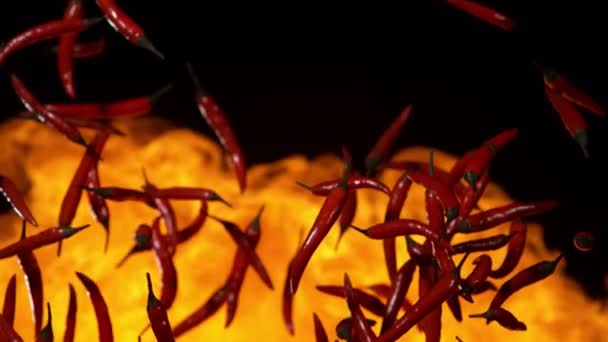 Super Slow Motion Flying Red Hot Chilli Peppers Fire Filmed — Stock Video
