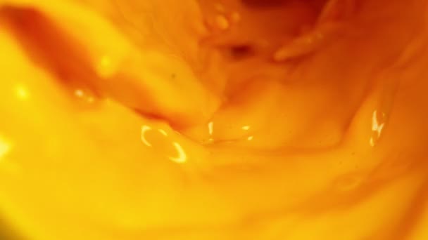 Super Slow Motion Pouring Orange Juice Twister Shape Filmed High — Stock Video