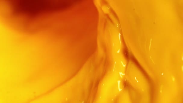 Super Slow Motion Pouring Orange Juice Twister Shape Filmed High — Stock Video