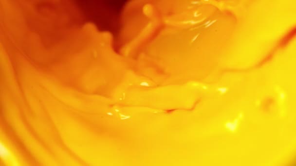 Super Slow Motion Pouring Orange Juice Twister Shape Filmed High — Stock Video