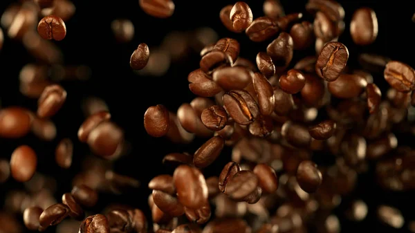 Färska rostade kaffebönor som flyger i luften — Stockfoto