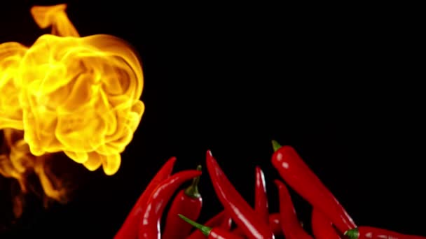 Super Slow Motion Flying Red Hot Chilli Peppers Fire Filmado — Vídeo de Stock
