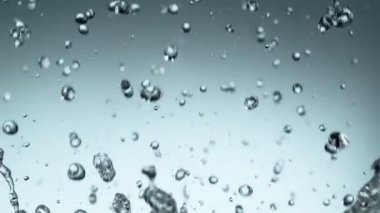Su damlaları sıçraması Süper yavaş hareket, makro lens üzerinde filme. Çok yüksek hızlı kamera Phantom Veo 4k, 1000 fps filme.
