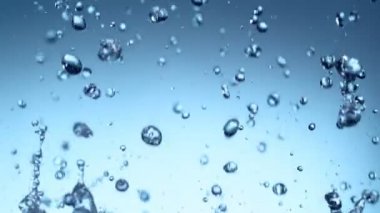 Su damlaları sıçraması Süper yavaş hareket, makro lens üzerinde filme. Çok yüksek hızlı kamera Phantom Veo 4k, 1000 fps filme.