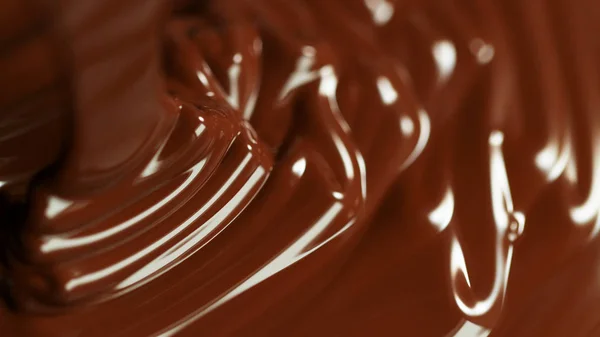 Detalhe de chocolate quente derretido derramando — Fotografia de Stock