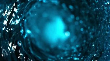 Kasırga şeklinde su dökmek süper yavaş bir hareket. Yüksek hızlı sinema kamerası, 1000 fps..