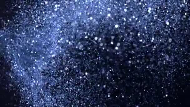 Super Zeitlupe Glitzernder Blauer Teilchen Auf Schwarzem Hintergrund Flache Tiefenschärfe — Stockvideo
