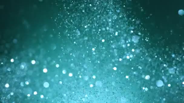 Super Slow Motion Glittering Blue Particles Black Background Shallow Depth — Stock Video