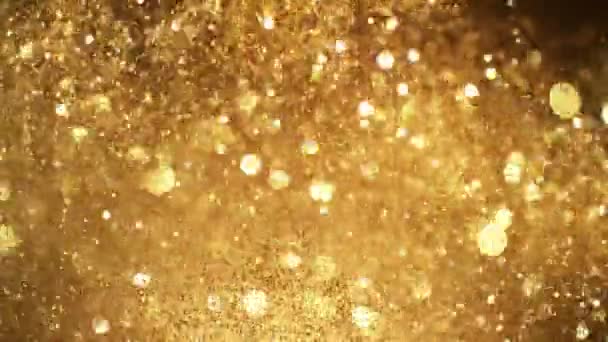 Super Langzame Beweging Van Glinsterende Gouden Deeltjes Zwarte Achtergrond Ondiepe — Stockvideo