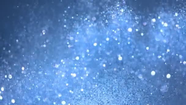 Super Slow Motion Glittering Blue Particles Black Background Shallow Depth — Stock Video