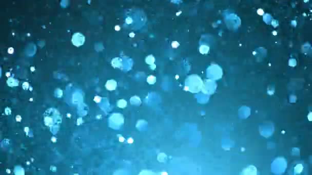 Super Zeitlupe Glitzernder Blauer Teilchen Auf Schwarzem Hintergrund Flache Tiefenschärfe — Stockvideo