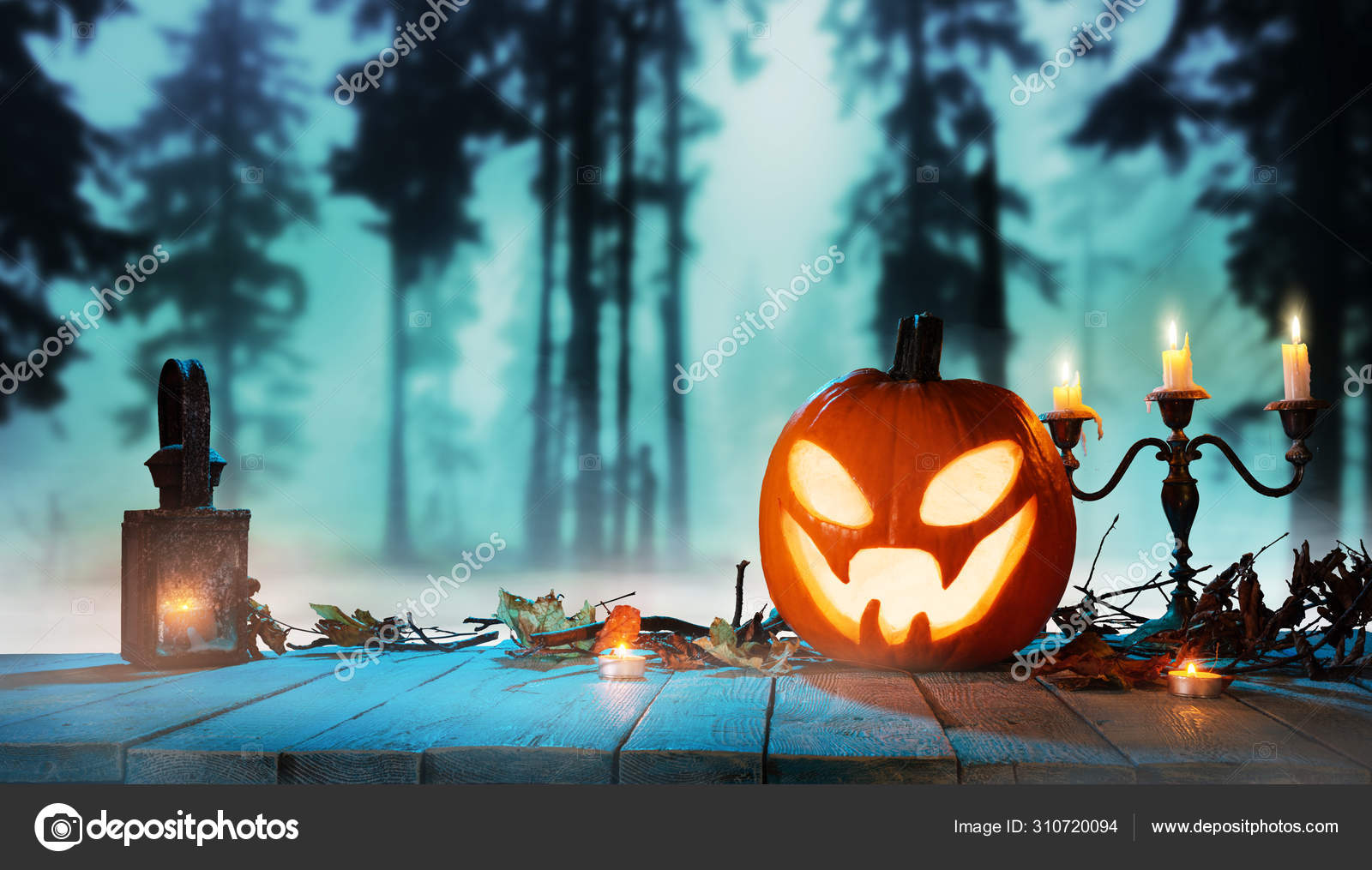 Spooky halloween pumpkin in forest Stock Photo by ©jag_cz 310720094