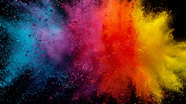 Explosion of colored powder on black background — Stock Photo, Image