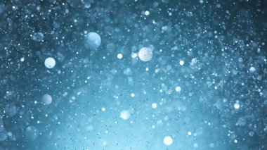Bulanık noktalı soyut mavi ışıltılı arkaplan.